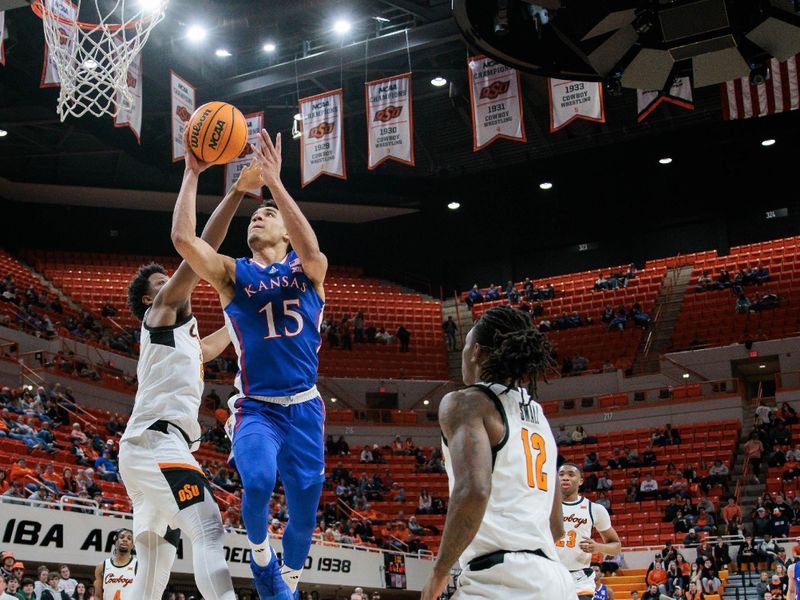 Jan 16, 2024; Stillwater, Oklahoma, USA; Kansas Jayhawks guard Kevin McCullar Jr. (15) puts up a shot during the second half against the Oklahoma State Cowboys at Gallagher-Iba Arena. Mandatory Credit: William Purnell-USA TODAY Sports