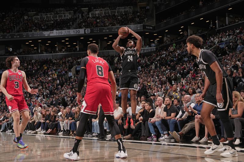 BROOKLYN, NY - NOVEMBER 9: Cam Thomas #24 of the Brooklyn Nets shoots a three point basket during the game  against the Chicago Bulls on November 9, 2024 at Barclays Center in Brooklyn, New York. NOTE TO USER: User expressly acknowledges and agrees that, by downloading and or using this Photograph, user is consenting to the terms and conditions of the Getty Images License Agreement. Mandatory Copyright Notice: Copyright 2024 NBAE (Photo by Jesse D. Garrabrant/NBAE via Getty Images)