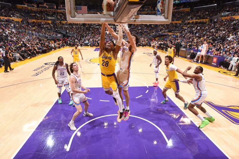 LOS ANGELES, CA - MARCH 4: Rui Hachimura #28 of the Los Angeles Lakers drives to the basket during the game against the Oklahoma City Thunder on March 4, 2024 at Crypto.Com Arena in Los Angeles, California. NOTE TO USER: User expressly acknowledges and agrees that, by downloading and/or using this Photograph, user is consenting to the terms and conditions of the Getty Images License Agreement. Mandatory Copyright Notice: Copyright 2024 NBAE (Photo by Andrew D. Bernstein/NBAE via Getty Images)