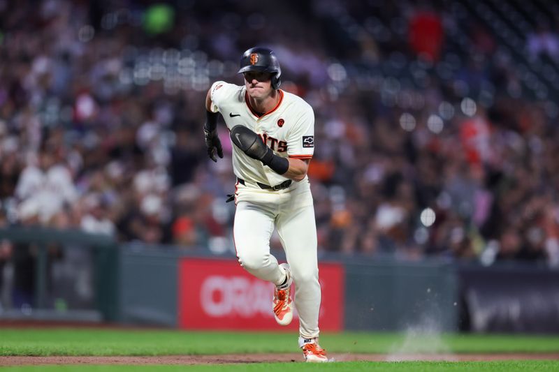 Aug 19, 2024; San Francisco, California, USA; San Francisco Giants shortstop Tyler Fitzgerald (49) scores a run during the fifth inning against the Chicago White Sox at Oracle Park. Mandatory Credit: Sergio Estrada-USA TODAY Sports