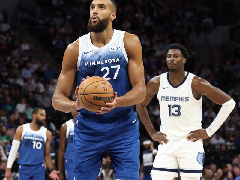 MINNEAPOLIS, MN -  FEBRUARY 28:  Rudy Gobert #27 of the Minnesota Timberwolves shoots a free throw during the game against the Memphis Grizzlies on February 28, 2024 at Target Center in Minneapolis, Minnesota. NOTE TO USER: User expressly acknowledges and agrees that, by downloading and or using this Photograph, user is consenting to the terms and conditions of the Getty Images License Agreement. Mandatory Copyright Notice: Copyright 2024 NBAE (Photo by Jordan Johnson/NBAE via Getty Images)