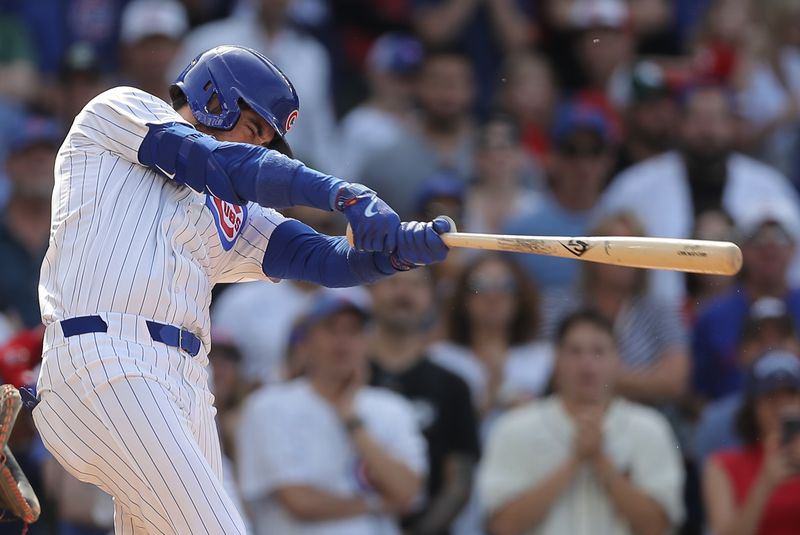 May 31, 2024; Chicago, Illinois, USA; Chicago Cubs outfielder Cody Bellinger (24) flies out during the ninth inning against the Cincinnati Reds at Wrigley Field. Mandatory Credit: Melissa Tamez-USA TODAY Sports