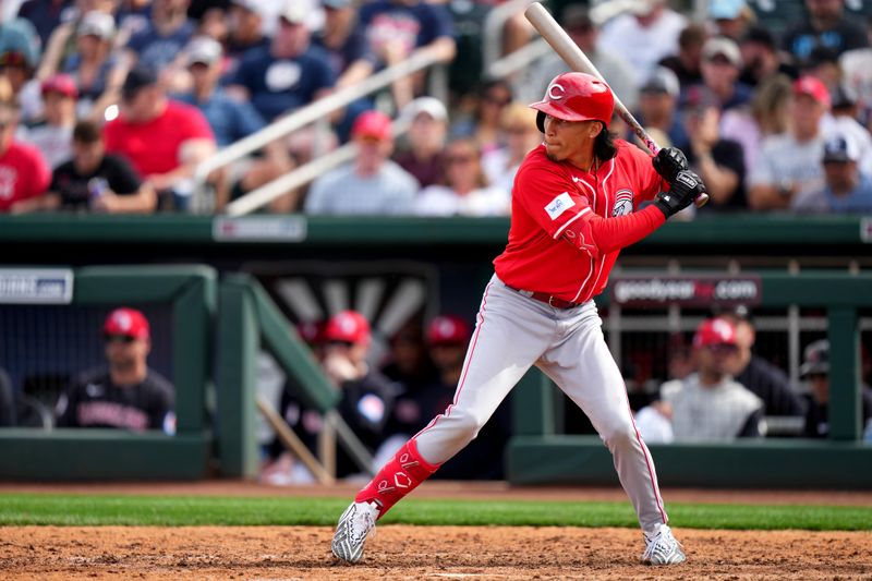 Feb. 24, 2024; Goodyear, Arizona, USA; Cincinnati Reds shortstop Edwin Arroyo bats in the seventh inning during a MLB spring training baseball game against the Cleveland Guardians at Goodyear Ballpark. Mandatory Credit: Kareem Elgazzar-USA TODAY Sports