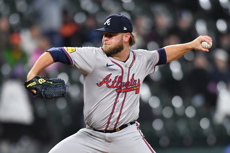 Apr 2, 2024; Chicago, Illinois, USA; Atlanta Braves relief pitcher A.J. Minter (33) pitches during the seventh inning against the Chicago White Sox at Guaranteed Rate Field. Mandatory Credit: Patrick Gorski-USA TODAY Sports