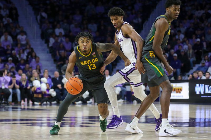 Jan 16, 2024; Manhattan, Kansas, USA; Baylor Bears guard Langston Love (13) dribbles by Kansas State Wildcats forward David N'Guessan (1) during the second half at Bramlage Coliseum. Mandatory Credit: Scott Sewell-USA TODAY Sports