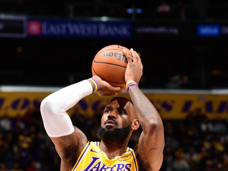 LOS ANGELES, CA - JANUARY 15:  LeBron James #23 of the Los Angeles Lakers shoots a free throw during the game against the Miami Heat on January 15, 2025 at Crypto.Com Arena in Los Angeles, California. NOTE TO USER: User expressly acknowledges and agrees that, by downloading and/or using this Photograph, user is consenting to the terms and conditions of the Getty Images License Agreement. Mandatory Copyright Notice: Copyright 2025 NBAE (Photo by Tyler Ross/NBAE via Getty Images)