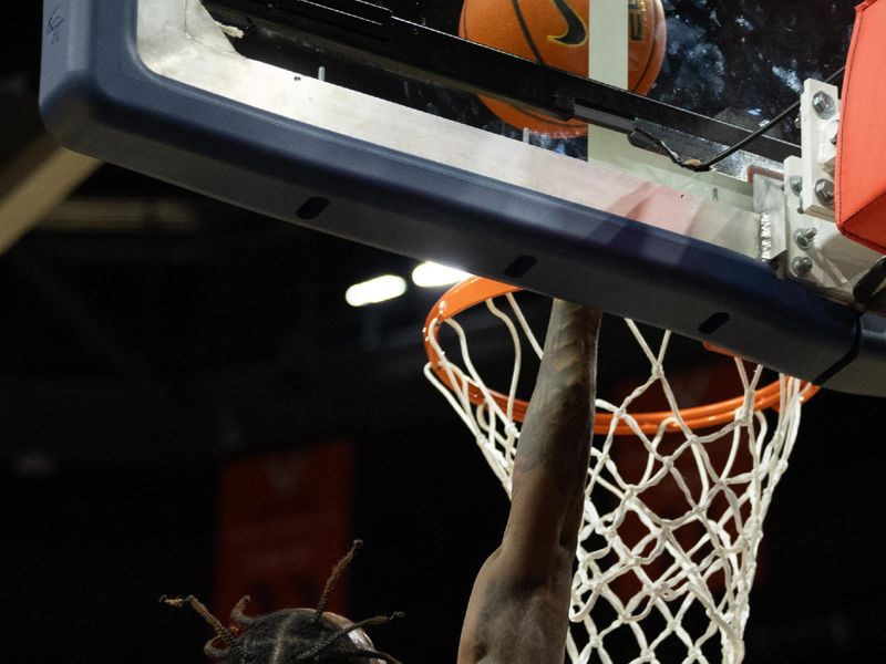 Feb 1, 2025; Charlottesville, Virginia, USA; Virginia Tech Hokies forward Tobi Lawal (1) shoots the ball against the Virginia Cavaliers in the second half at John Paul Jones Arena. Mandatory Credit: Emily Morgan-Imagn Images