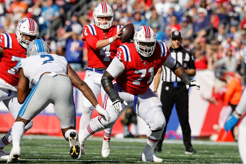 New England Patriots guard Mike Onwenu looks to block against the Detroit Lions during an NFL football game at Gillette Stadium, Sunday, Oct. 9, 2022 in Foxborough, Mass. (Winslow Townson/AP Images for Panini)