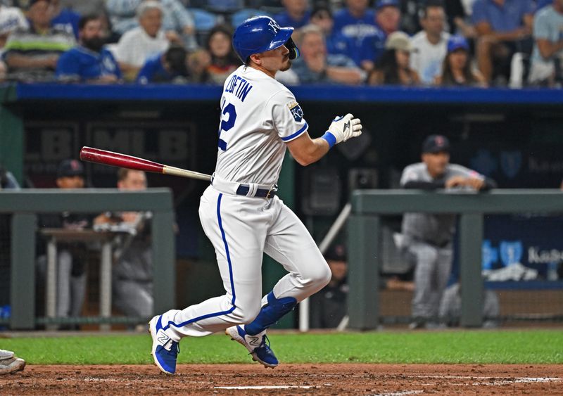 Sep 19, 2023; Kansas City, Missouri, USA; Kansas City Royals second baseman Nick Loftin (12) hits an RBI single in the third inning against the Cleveland Guardians at Kauffman Stadium. Mandatory Credit: Peter Aiken-USA TODAY Sports