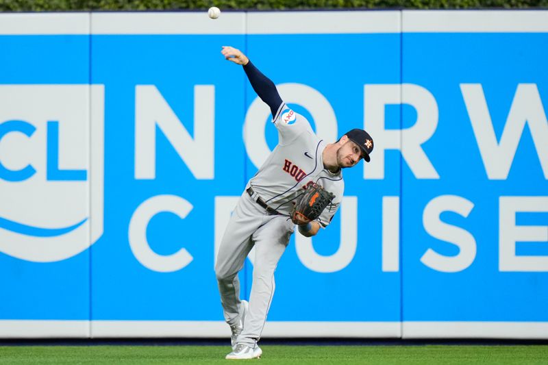 Aug 16, 2023; Miami, Florida, USA; Houston Astros right fielder Kyle Tucker (30) throws the ball to second base against the Miami Marlins during the third inning at loanDepot Park. Mandatory Credit: Rich Storry-USA TODAY Sports