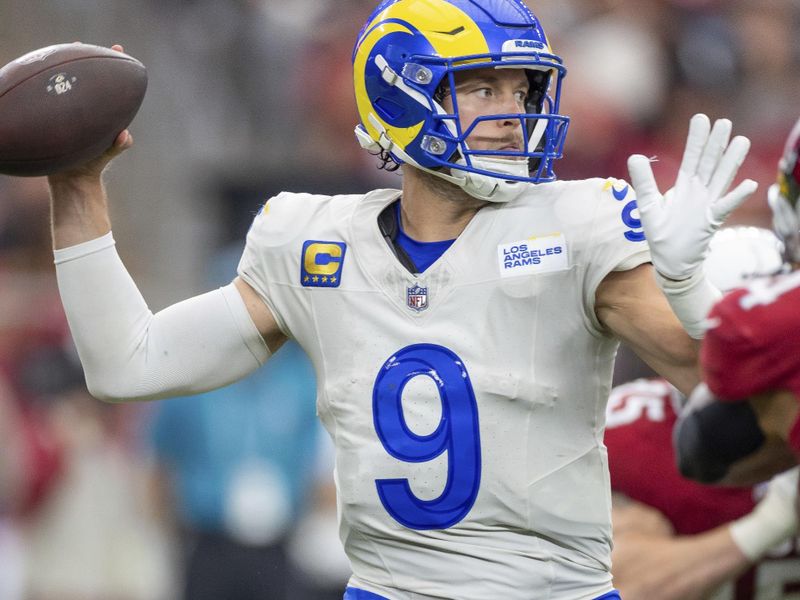 Los Angeles Rams quarterback Matthew Stafford (9) passes the ball against the Arizona Cardinals in an NFL football game, Sunday, Sept. 15, 2024, in Glendale, Ariz. Cardinals defeated the Rams 41-10. (AP Photo/Jeff Lewis)