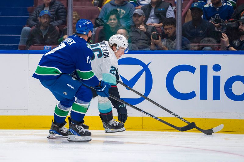 Sep 24, 2024; Vancouver, British Columbia, CAN; Seattle Kraken forward Ryan Winterton (26) skates past Vancouver Canucks forward Daniel Sprong (17) during the second period at Rogers Arena. Mandatory Credit: Bob Frid-Imagn Images