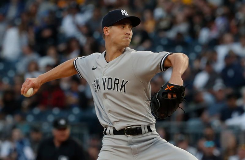 Sep 16, 2023; Pittsburgh, Pennsylvania, USA; New York Yankees starting pitcher Luke Weaver (30) delivers a pitch pitch against the Pittsburgh Pirates during the first inning at PNC Park. Mandatory Credit: Charles LeClaire-USA TODAY Sports