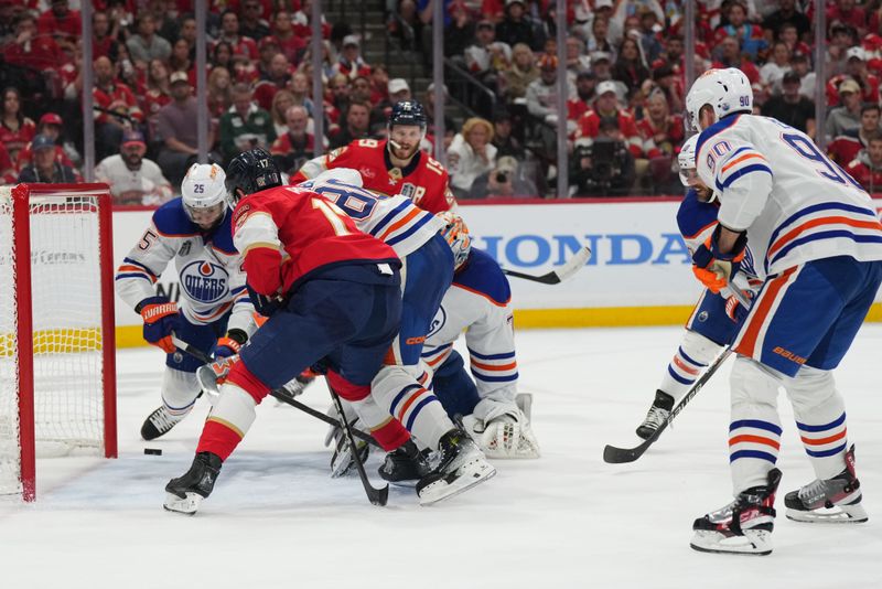 Jun 18, 2024; Sunrise, Florida, USA; Edmonton Oilers defenseman Darnell Nurse (25) defends against a goal by Florida Panthers forward Matthew Tkachuk (19) during the second period in game five of the 2024 Stanley Cup Final at Amerant Bank Arena. Mandatory Credit: Jim Rassol-USA TODAY Sports