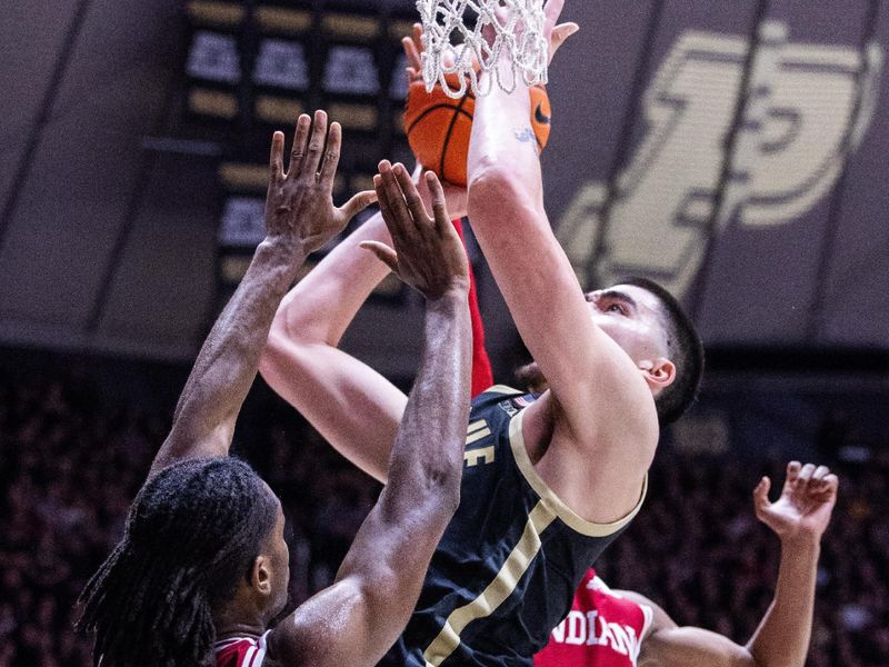 Feb 10, 2024; West Lafayette, Indiana, USA; Purdue Boilermakers center Zach Edey (15)  shoots the ball while Indiana Hoosiers forward Anthony Walker (4) defends in the second half at Mackey Arena. Mandatory Credit: Trevor Ruszkowski-USA TODAY Sports