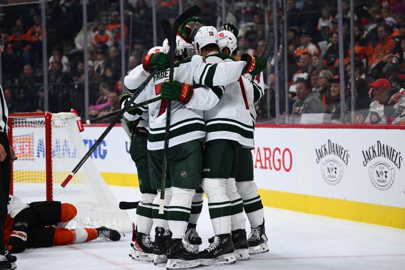 Oct 26, 2024; Philadelphia, Pennsylvania, USA; The Minnesota Wild celebrate after a goal from center Joel Eriksson Ek (14) against the Philadelphia Flyers in the second period at Wells Fargo Center. Mandatory Credit: Kyle Ross-Imagn Images