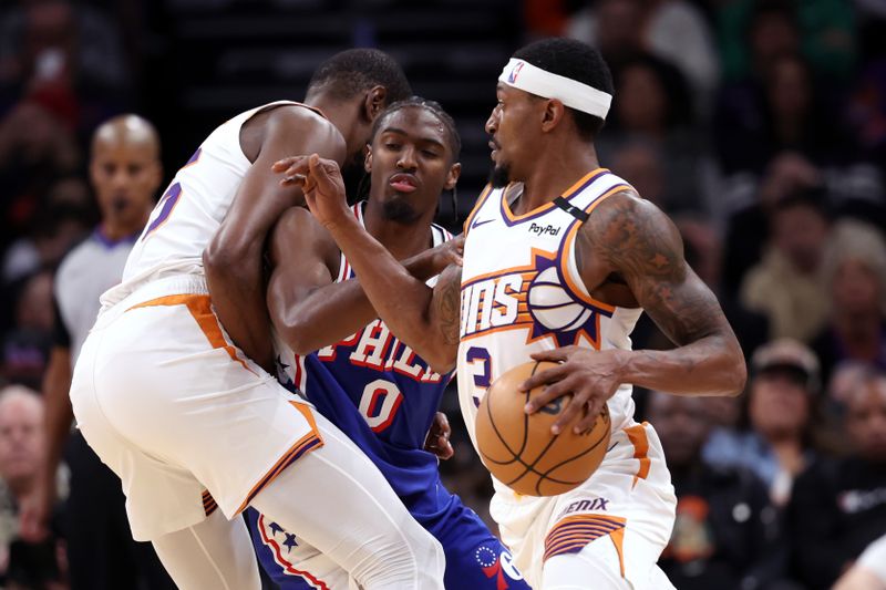 PHOENIX, ARIZONA - NOVEMBER 04: Bradley Beal #3 of the Phoenix Suns dribbles around a screen set by Kevin Durant #35 on Tyrese Maxey #0 of the Philadelphia 76ers during the first half at Footprint Center on November 04, 2024 in Phoenix, Arizona. NOTE TO USER: User expressly acknowledges and agrees that, by downloading and or using this photograph, User is consenting to the terms and conditions of the Getty Images License Agreement.  (Photo by Chris Coduto/Getty Images)