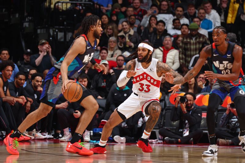 TORONTO, CANADA - MARCH 25: Gary Trent Jr. #33 of the Toronto Raptors plays defense during the game against the Brooklyn Nets on March 25, 2024 at the Scotiabank Arena in Toronto, Ontario, Canada.  NOTE TO USER: User expressly acknowledges and agrees that, by downloading and or using this Photograph, user is consenting to the terms and conditions of the Getty Images License Agreement.  Mandatory Copyright Notice: Copyright 2024 NBAE (Photo by Vaughn Ridley/NBAE via Getty Images)