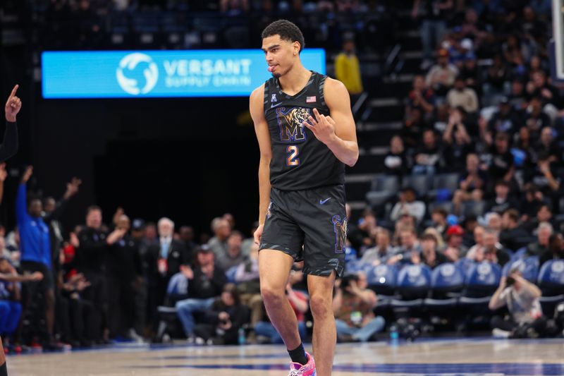 Feb 26, 2025; Memphis, Tennessee, USA; Memphis Tigers forward Nicholas Jourdain (2) reacts after a three point basket against the Rice Owls during the first half at FedExForum. Mandatory Credit: Wesley Hale-Imagn Images