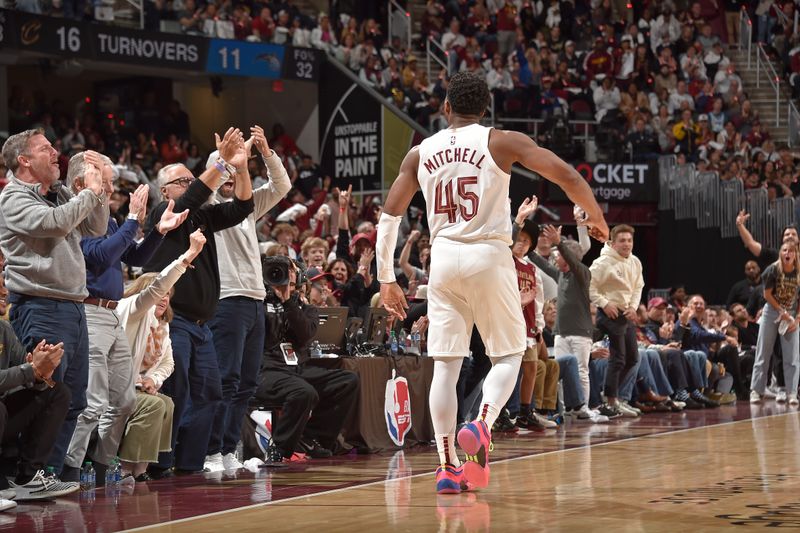 CLEVELAND, OH - APRIL 20: Donovan Mitchell #45 of the Cleveland Cavaliers celebrates during Round 1 Game 1 of the 2024 NBA Playoffs against the Orlando Magic on April 20, 2024 at Rocket Mortgage FieldHouse in Cleveland, Ohio. NOTE TO USER: User expressly acknowledges and agrees that, by downloading and/or using this Photograph, user is consenting to the terms and conditions of the Getty Images License Agreement. Mandatory Copyright Notice: Copyright 2024 NBAE (Photo by David Liam Kyle/NBAE via Getty Images)