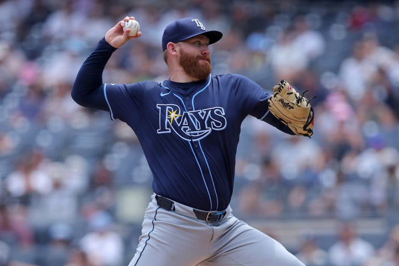 Jul 22, 2024; Bronx, New York, USA; Tampa Bay Rays starting pitcher Zack Littell (52) pitches against the New York Yankees during the first inning at Yankee Stadium. Mandatory Credit: Brad Penner-USA TODAY Sports