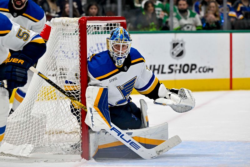 Apr 17, 2024; Dallas, Texas, USA; St. Louis Blues goaltender Jordan Binnington (50) faces the Dallas Stars attack during the overtime period at the American Airlines Center. Mandatory Credit: Jerome Miron-USA TODAY Sports