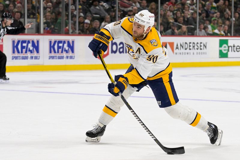 Mar 10, 2024; Saint Paul, Minnesota, USA;  Nashville Predators forward Ryan O'Reilly (90) scores a power play goal against the Minnesota Wild during the third period at Xcel Energy Center. Mandatory Credit: Nick Wosika-USA TODAY Sports

