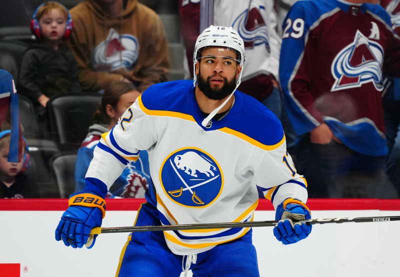 Nov 13, 2025; Denver, Colorado, USA; Buffalo Sabres left wing Jordan Greenway (12) before a game against the Colorado Avalanche at Ball Arena. Mandatory Credit: Ron Chenoy-Imagn Images