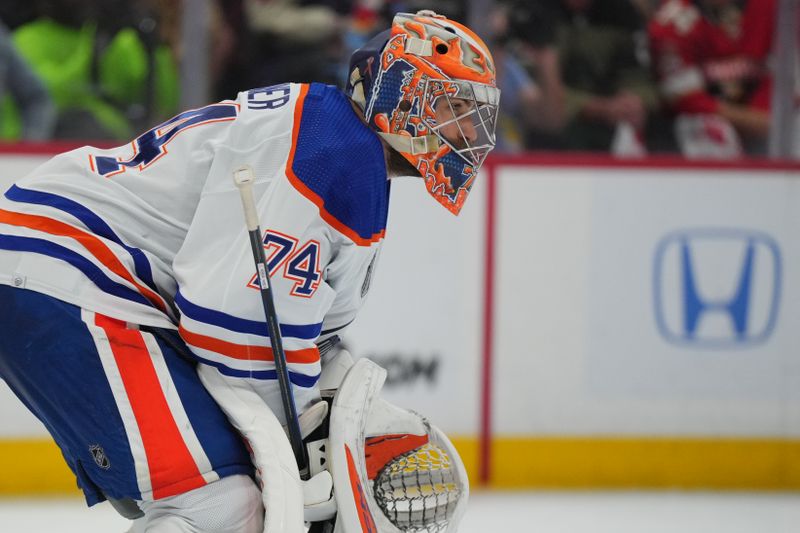 Jun 24, 2024; Sunrise, Florida, USA; Edmonton Oilers goaltender Skinner Stuart (74) watches play during the second period against the Florida Panthers in game seven of the 2024 Stanley Cup Final at Amerant Bank Arena. Mandatory Credit: Jim Rassol-USA TODAY Sports