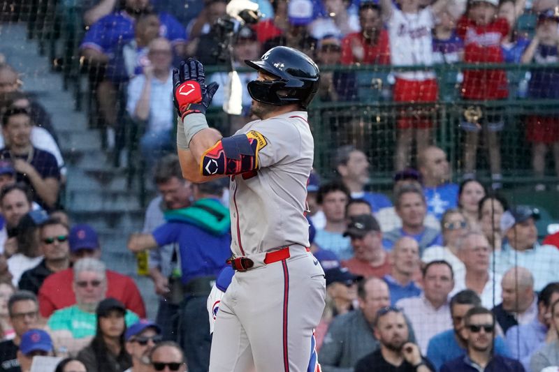 May 22, 2024; Chicago, Illinois, USA; Atlanta Braves outfielder Adam Duvall (14) celebrates his two-run home run against the Chicago Cubs during the third inning at Wrigley Field. Mandatory Credit: David Banks-USA TODAY Sports