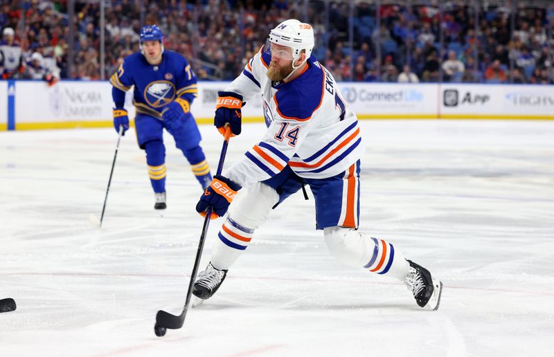 Mar 9, 2024; Buffalo, New York, USA;  Edmonton Oilers defenseman Mattias Ekholm (14) takes a shot on goal during the first period against the Buffalo Sabres at KeyBank Center. Mandatory Credit: Timothy T. Ludwig-USA TODAY Sports