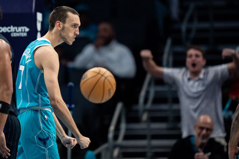 CHARLOTTE, NORTH CAROLINA - APRIL 05: Aleksej Pokusevski #17 of the Charlotte Hornets reacts in the third quarter during their game against the Orlando Magic at Spectrum Center on April 05, 2024 in Charlotte, North Carolina. NOTE TO USER: User expressly acknowledges and agrees that, by downloading and or using this photograph, User is consenting to the terms and conditions of the Getty Images License Agreement. (Photo by Jacob Kupferman/Getty Images)