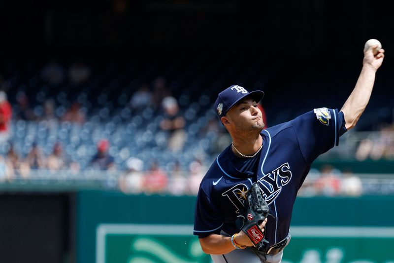 Apr 5, 2023; Washington, District of Columbia, USA; Tampa Bay Rays starting pitcher Shane McClanahan (18) pitches against the Washington Nationals during the first inning at Nationals Park. Mandatory Credit: Geoff Burke-USA TODAY Sports