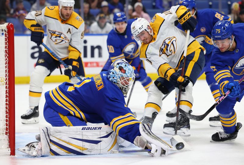 Dec 3, 2023; Buffalo, New York, USA;  Buffalo Sabres goaltender Ukko-Pekka Luukkonen (1) makes a save during the first period against the Nashville Predators at KeyBank Center. Mandatory Credit: Timothy T. Ludwig-USA TODAY Sports