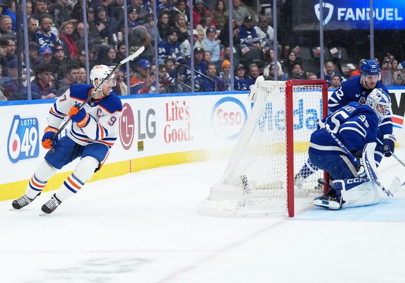 Dec 13, 2025; Toronto, Ontario, CAN; Edmonton Oilers center Connor McDavid (97) scores a goal against the Toronto Maple Leafs during the second period at Scotiabank Arena. Mandatory Credit: Nick Turchiaro-Imagn Images
