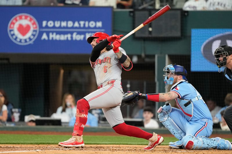 Apr 28, 2024; Arlington, Texas, USA; Cincinnati Reds second baseman Jonathan India (6) follows through on his single against the Texas Rangers during the fifth inning at Globe Life Field. Mandatory Credit: Jim Cowsert-USA TODAY Sports