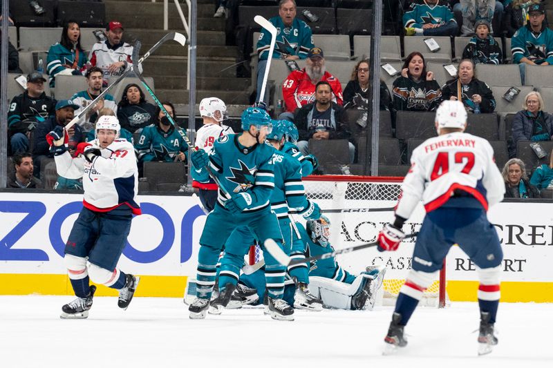 Nov 27, 2023; San Jose, California, USA; Washington Capitals left wing Beck Malenstyn (47) and Washington Capitals right wing Anthony Mantha (39) celebrate after the goal by Washington Capitals center Evgeny Kuznetsov (92) against San Jose Sharks goaltender Mackenzie Blackwood (29) during the second period at SAP Center at San Jose. Mandatory Credit: Neville E. Guard-USA TODAY Sports