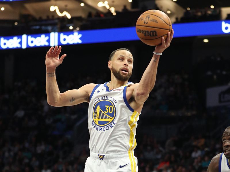 CHARLOTTE, NC - MARCH 3:  Stephen Curry #30 of the Golden State Warriors grabs the rebound during the game against the Charlotte Hornets on March 3, 2025 at Spectrum Center in Charlotte, North Carolina. NOTE TO USER: User expressly acknowledges and agrees that, by downloading and or using this photograph, User is consenting to the terms and conditions of the Getty Images License Agreement. Mandatory Copyright Notice: Copyright 2025 NBAE (Photo by Brock Williams-Smith/NBAE via Getty Images)