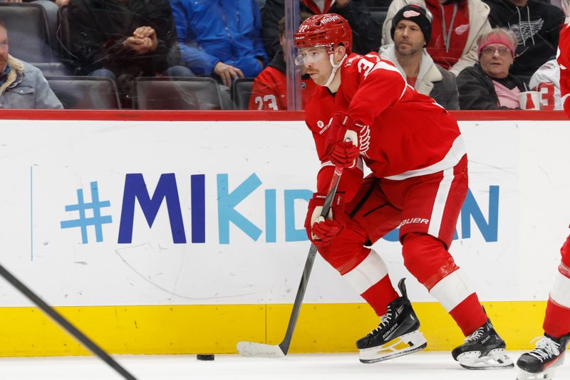 Jan 18, 2026; Detroit, Michigan, USA;  Detroit Red Wings left wing J.T. Compher (37) skates with the puck in the second period against the Ottawa Senators at Little Caesars Arena. Mandatory Credit: Rick Osentoski-Imagn Images