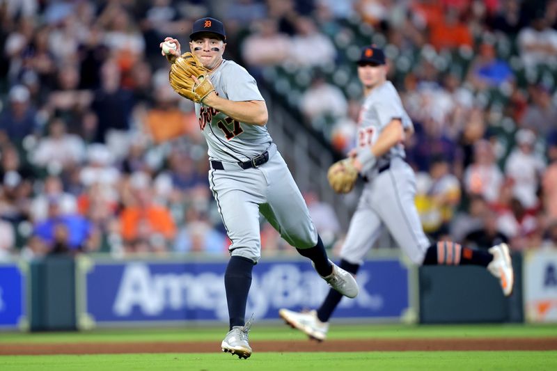 Apr 30, 2025; Houston, Texas, USA; Detroit Tigers third baseman Jace Jung (17) throws a fielded ball to first base for an out against the Houston Astros during the fifth inning at Daikin Park. Mandatory Credit: Erik Williams-Imagn Images