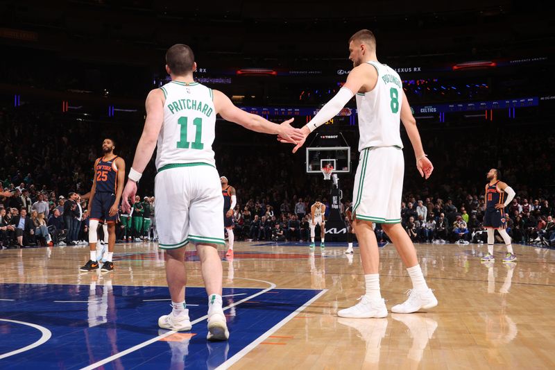NEW YORK, NY - APRIL 8: Payton Pritchard #11 high fives OG Anunoby #8 of the New York Knicks during the game against the New York Knicks  on April 8, 2025 at Madison Square Garden in New York City, New York.  NOTE TO USER: User expressly acknowledges and agrees that, by downloading and or using this photograph, User is consenting to the terms and conditions of the Getty Images License Agreement. Mandatory Copyright Notice: Copyright 2025 NBAE  (Photo by Nathaniel S. Butler/NBAE via Getty Images)