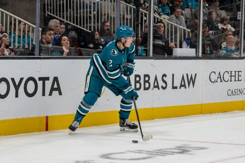 Nov 5, 2024; San Jose, California, USA;  San Jose Sharks center Will Smith (2) controls the puck behind the net against the Columbus Blue Jackets during the second period at SAP Center at San Jose. Mandatory Credit: Neville E. Guard-Imagn Images