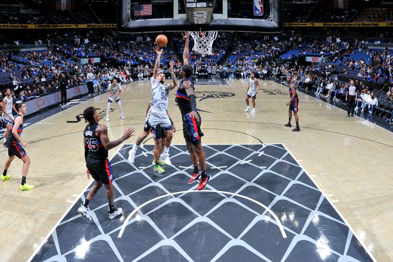 ORLANDO, FL - NOVEMBER 23: Cole Anthony #50 of the Orlando Magic shoots the ball during the game against the Detroit Pistons on November 23, 2024 at Kia Center in Orlando, Florida. NOTE TO USER: User expressly acknowledges and agrees that, by downloading and or using this photograph, User is consenting to the terms and conditions of the Getty Images License Agreement. Mandatory Copyright Notice: Copyright 2024 NBAE (Photo by Fernando Medina/NBAE via Getty Images)