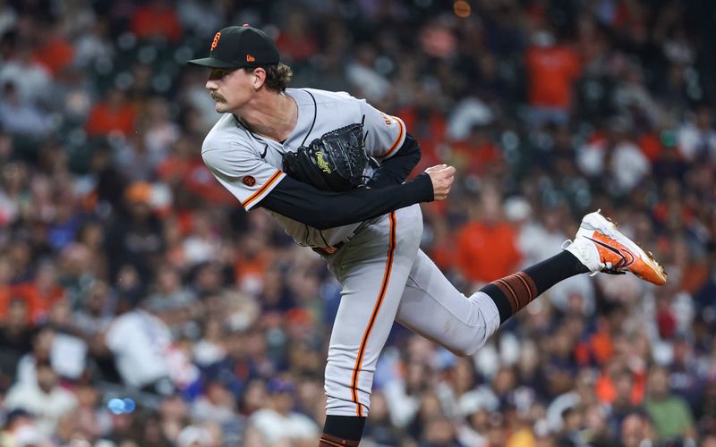 May 1, 2023; Houston, Texas, USA; San Francisco Giants relief pitcher Sean Hjelle (64) delivers a pitch during the seventh inning against the Houston Astros at Minute Maid Park. Mandatory Credit: Troy Taormina-USA TODAY Sports