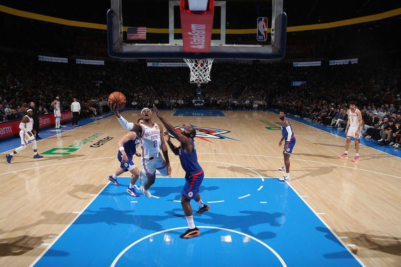 OKLAHOMA CITY, OK - FEBRUARY 22:  Shai Gilgeous-Alexander #2 of the Oklahoma City Thunder drives to the basket during the game against the LA Clippers on February 22, 2024 at Paycom Arena in Oklahoma City, Oklahoma. NOTE TO USER: User expressly acknowledges and agrees that, by downloading and or using this photograph, User is consenting to the terms and conditions of the Getty Images License Agreement. Mandatory Copyright Notice: Copyright 2024 NBAE (Photo by Zach Beeker/NBAE via Getty Images)