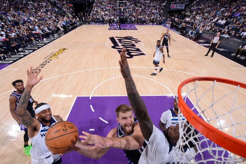 SACRAMENTO, CA - OCTOBER 24: DeMar DeRozan #10 of the Sacramento Kings drives to the basket during the game against the Minnesota Timberwolves on October 24, 2024 at Golden 1 Center in Sacramento, California. NOTE TO USER: User expressly acknowledges and agrees that, by downloading and or using this Photograph, user is consenting to the terms and conditions of the Getty Images License Agreement. Mandatory Copyright Notice: Copyright 2024 NBAE (Photo by Rocky Widner/NBAE via Getty Images)