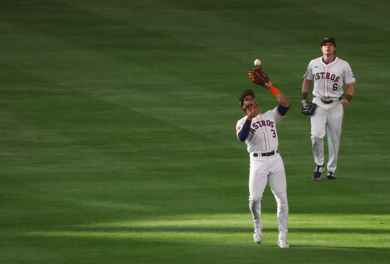 May 18, 2024; Houston, Texas, USA; Houston Astros shortstop Jeremy Pena (3) catches a Milwaukee Brewers fly ball for an out in the second inning at Minute Maid Park. Mandatory Credit: Thomas Shea-USA TODAY Sports
