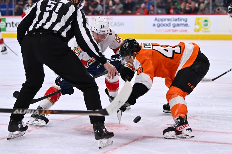 Mar 21, 2023; Philadelphia, Pennsylvania, USA; Philadelphia Flyers center Morgan Frost (48) wins a faceoff against Florida Panthers center Sam Reinhart (13) in the second period at Wells Fargo Center. Mandatory Credit: Kyle Ross-USA TODAY Sports