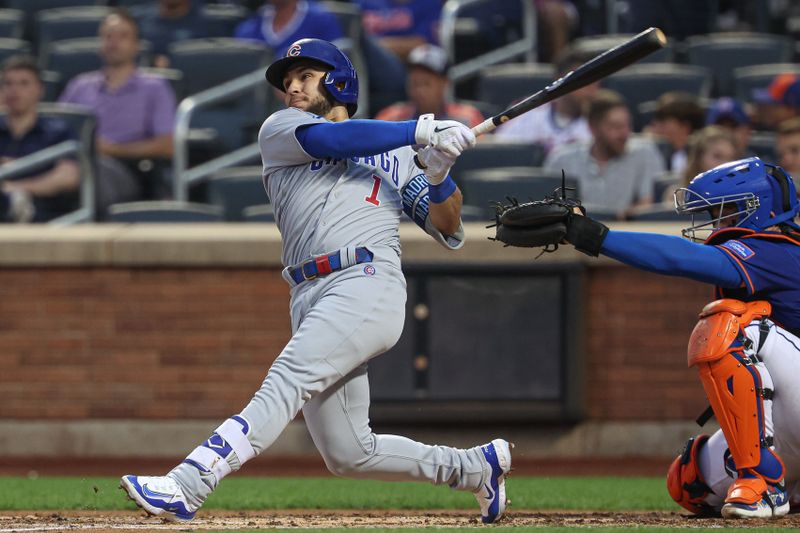 Aug 7, 2023; New York City, New York, USA; Chicago Cubs third baseman Nick Madrigal (1) hits a single during the third inning against the New York Mets at Citi Field. Mandatory Credit: Vincent Carchietta-USA TODAY Sports