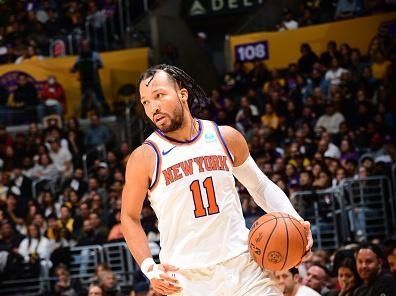 LOS ANGELES, CA - DECEMBER 18:  Jalen Brunson #11 of the New York Knicks handles the ball during the game  on December 18, 2023 at Crypto.Com Arena in Los Angeles, California. NOTE TO USER: User expressly acknowledges and agrees that, by downloading and/or using this Photograph, user is consenting to the terms and conditions of the Getty Images License Agreement. Mandatory Copyright Notice: Copyright 2023 NBAE (Photo by Adam Pantozzi/NBAE via Getty Images)